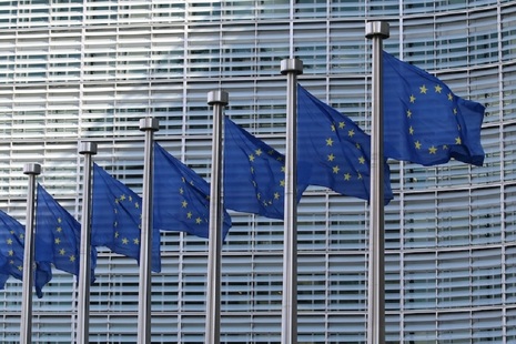 European Union flag in front of the European Commission building