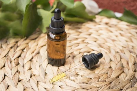 CBD oil flask and dropper