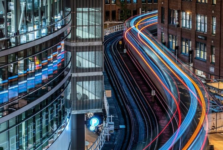 Railway going through a modern city.