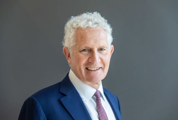 Peter Freeman, Chair of Homes England, smiling