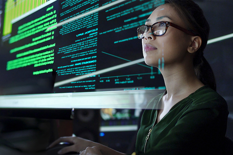 Woman looking at computer screen