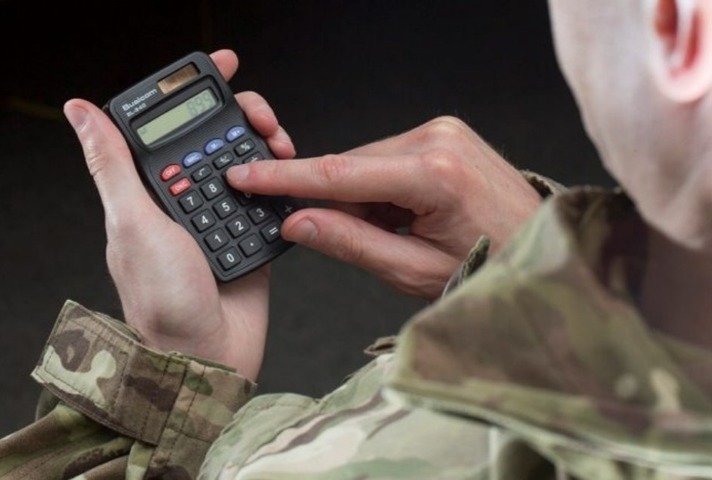 Veteran holding calculator