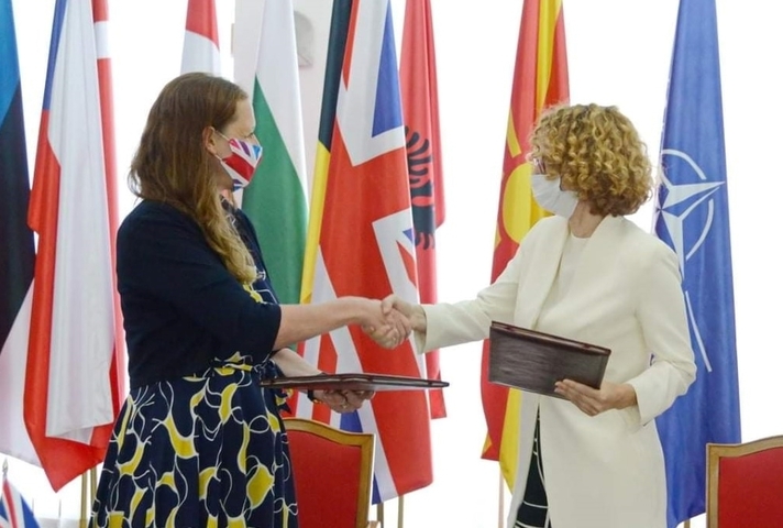 UK Ambassador Rachel Galloway and the Defence Minister for North Macedonia Radmila Shekerinska shake hands