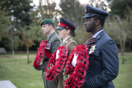 Military personnel with wreaths at the National Memorial Arboretum