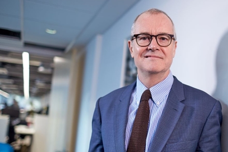 Picture of Sir Patrick Vallance standing in an office.
