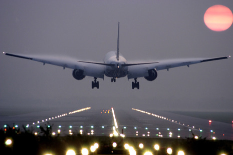 Passenger plane taking off from an airport.