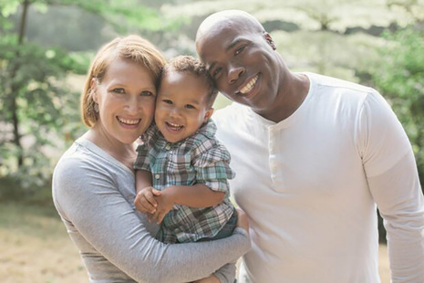 Mother, father and young son family photo