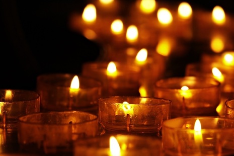 Tea light candles flickering at night