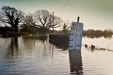 Water level gauge at Barcombe Mills in flood at East Sussex