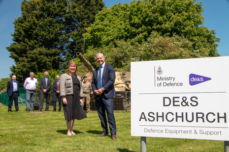 Belinda Lunn, Senior Responsible Owner for the Vehicle Storage Support Programme and Steven Holbrook, Managing Director of Skanska, are pictured next to a sign which reads DE&S Ashchurch