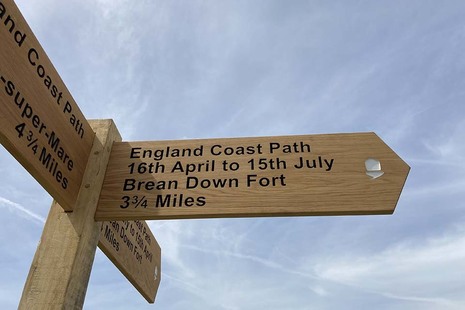 A sign showing the way on the England Coast Path in Somerset