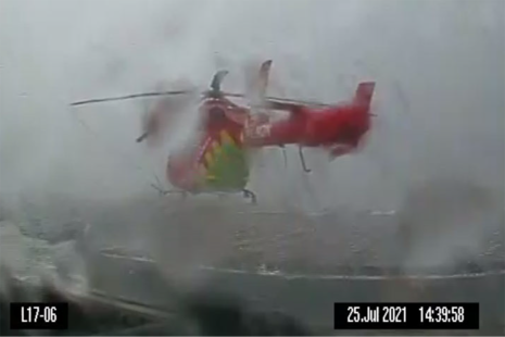 G-LNDN on the helipad at Royal London Hospital during heavy rainfall