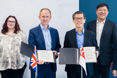 Group photo featuring Tom Read, Chief Executive of GDS and Mr Kok Ping Soon, Chief Executive, GovTech Singapore.