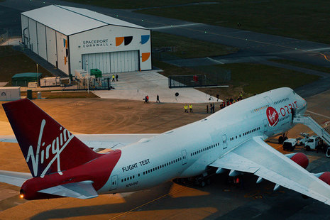 Plane in front of hangar at Spaceport Cornwall.
