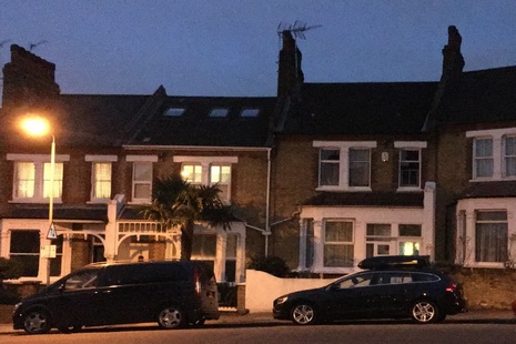 Victorian terraced housing at night