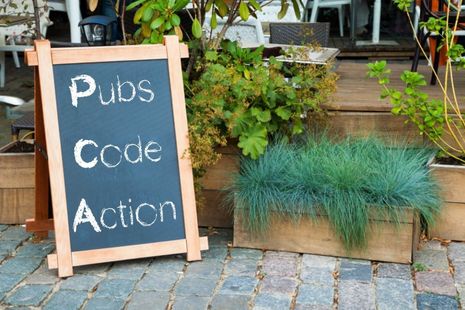 Chalk board with Pubs Code Action