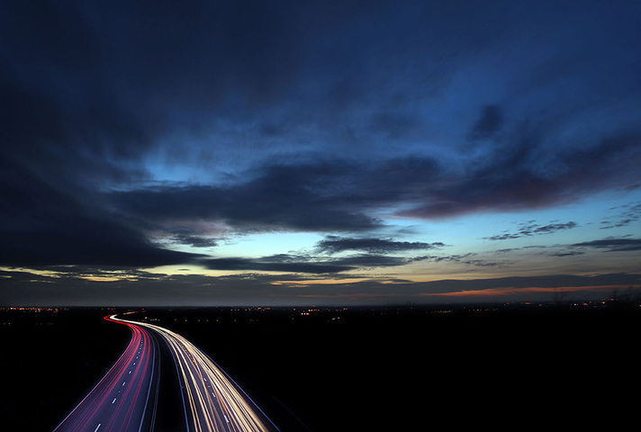 Traffic on a motorway at night.
