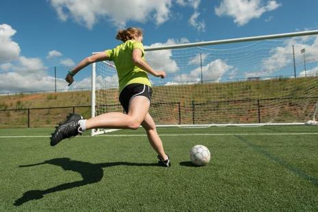girl practising a penalty shoot