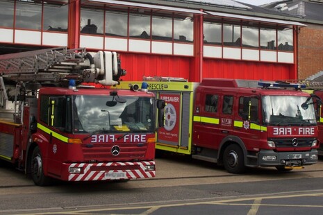 Fire engines parked outside a fire station