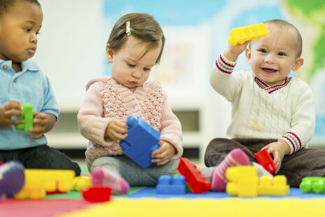 children playing in nursery