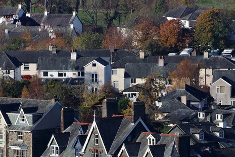 Houses and trees in a rural setting.
