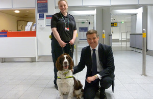 Mark Harper with drug detection dog