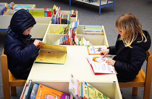 Children reading books in school