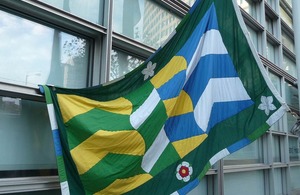 Flag of Cumbria outside Eland House