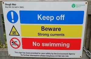 Photo telling people to keep of Slough weir