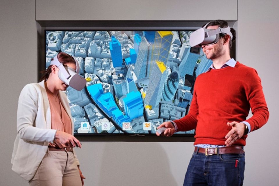 Image showing two people wearing virtual reality headsets.