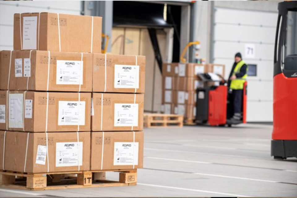 Image depicts a stack of boxes outside MOD Donnington Defence Fulfilment Centre.