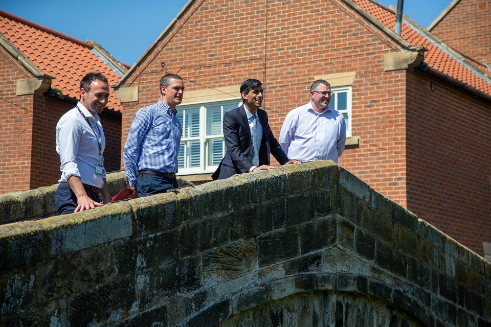 Image shows Rishi Sunak MP with Environment Agency staff 