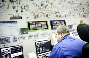 Sellafield worker sitting in the control room in the magnox reprocessing facility