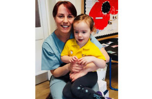 Lance Corporal Kelly Hawthorne with her daughter Gracie.