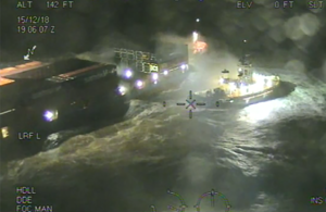 Still taken from SAR helicopter video footage showing both vessels aground in storm force conditions
