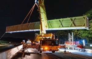 One of the superspan gantries is lifted onto the M6 using the specialist crane