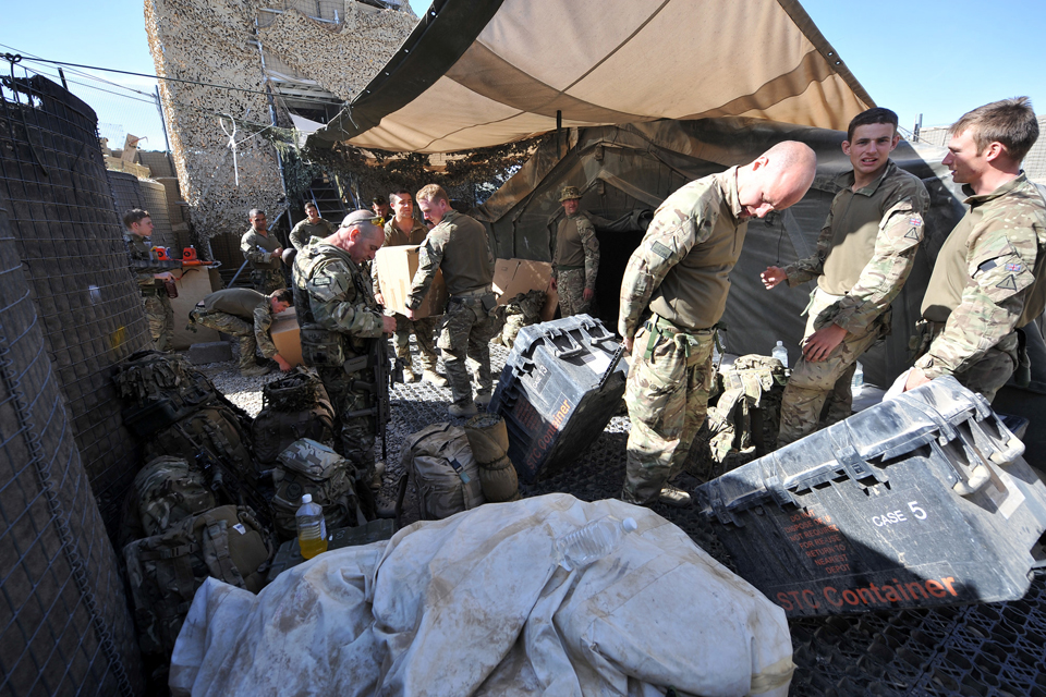 British soldiers move their kit and equipment out of Checkpoint Abpashak East