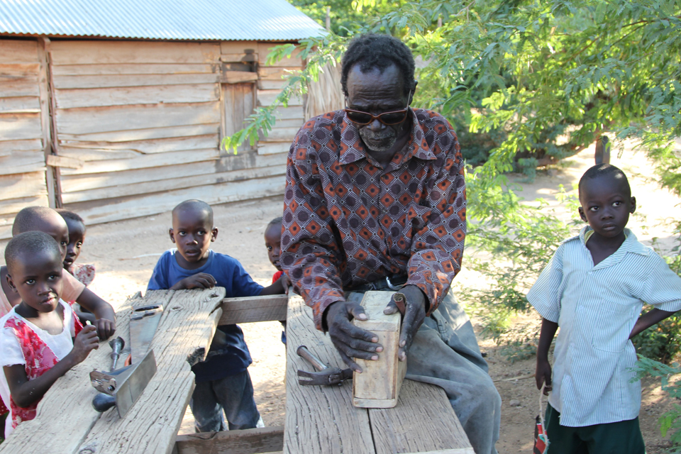 Wilson is blind and uses the money he receives to buy materials to make moneyboxes. Picture: Marisol Grandon/DFID