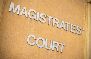 Image of magistrates'court sign on building