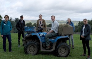 The Chancellor and Minister Prentis on a hill with farmers participating in the Payment by Results pilot and advisers from Natural England and the Yorkshire Dales National Park Authority