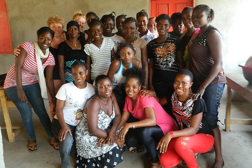 Miriam Mason-Sesay with all the EducAid female staff launching the EducAid Now newsletter for all the girls and women