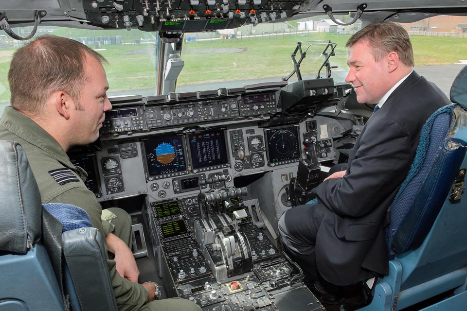 Mark Francois is given a tour of the cockpit of a C-17