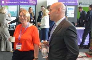Elaine Burrage, alongside colleague Darren Simpson, smiles at the camwera during a break at the One NDA Safety and Wellbeing Awards 2019 in Manchester