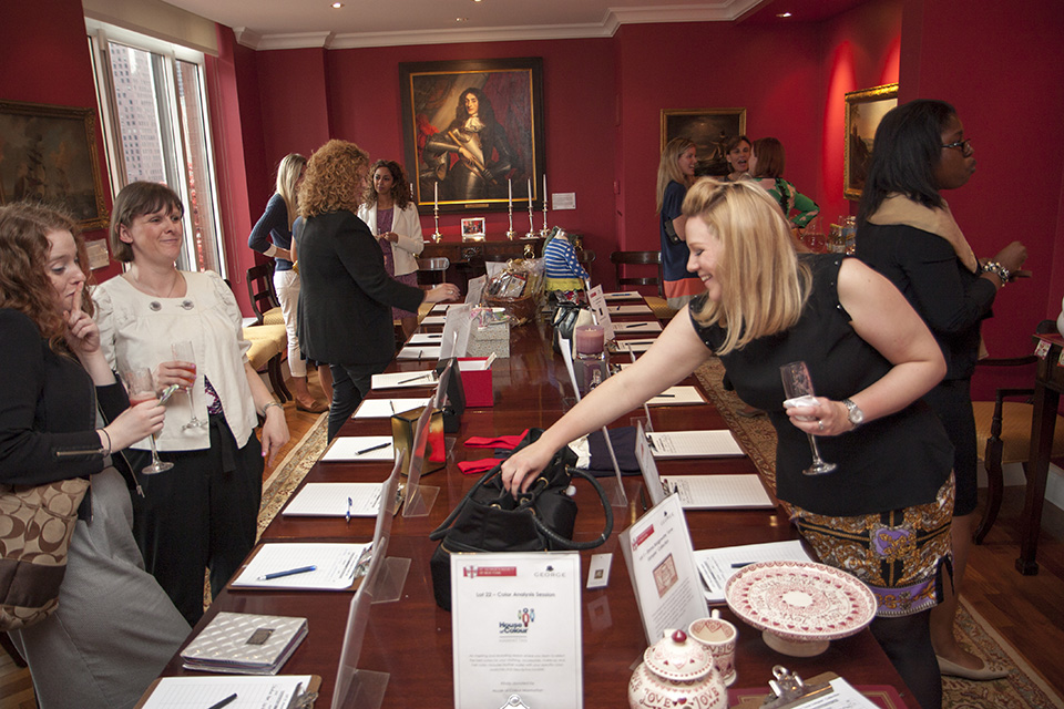 Guests bid on British gifts at the silent auction.