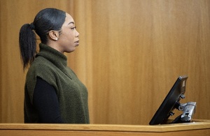 Woman giving evidence in courtroom