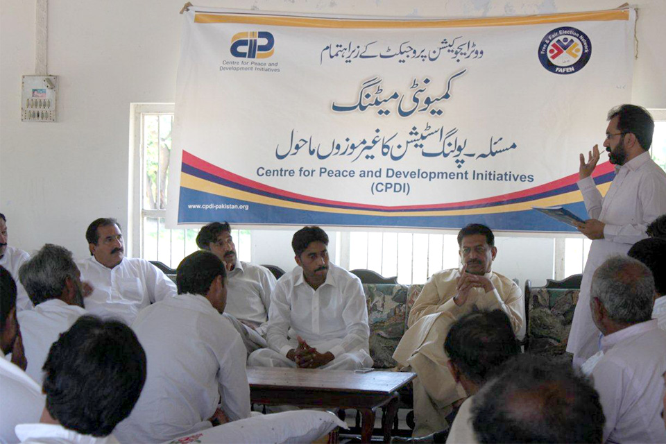 Community meetings with men play a crucial role in helping increase women's participation in elections. Picture: DFID Pakistan