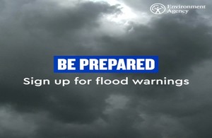 A poster saying Be prepared, sign up for flood warnings