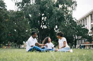 Family in outdoor green space