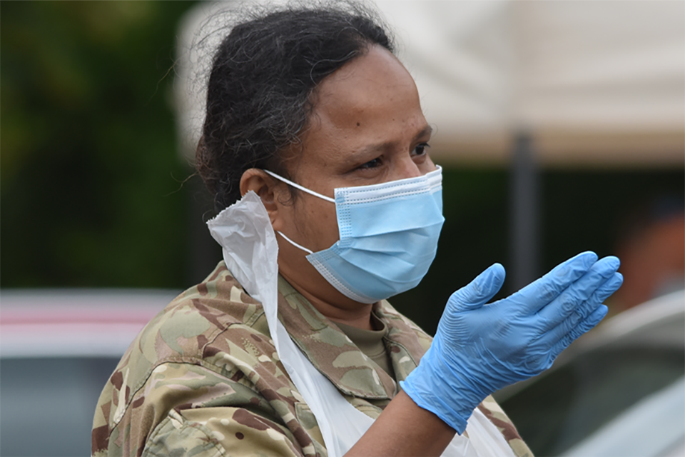 A reservist from the Royal Auxiliary Air Force in support of COVID-19, wearing a mask to show commitment to keeping safe.