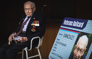 Image of Captain Sir Tom Moore with his veterans railcard.